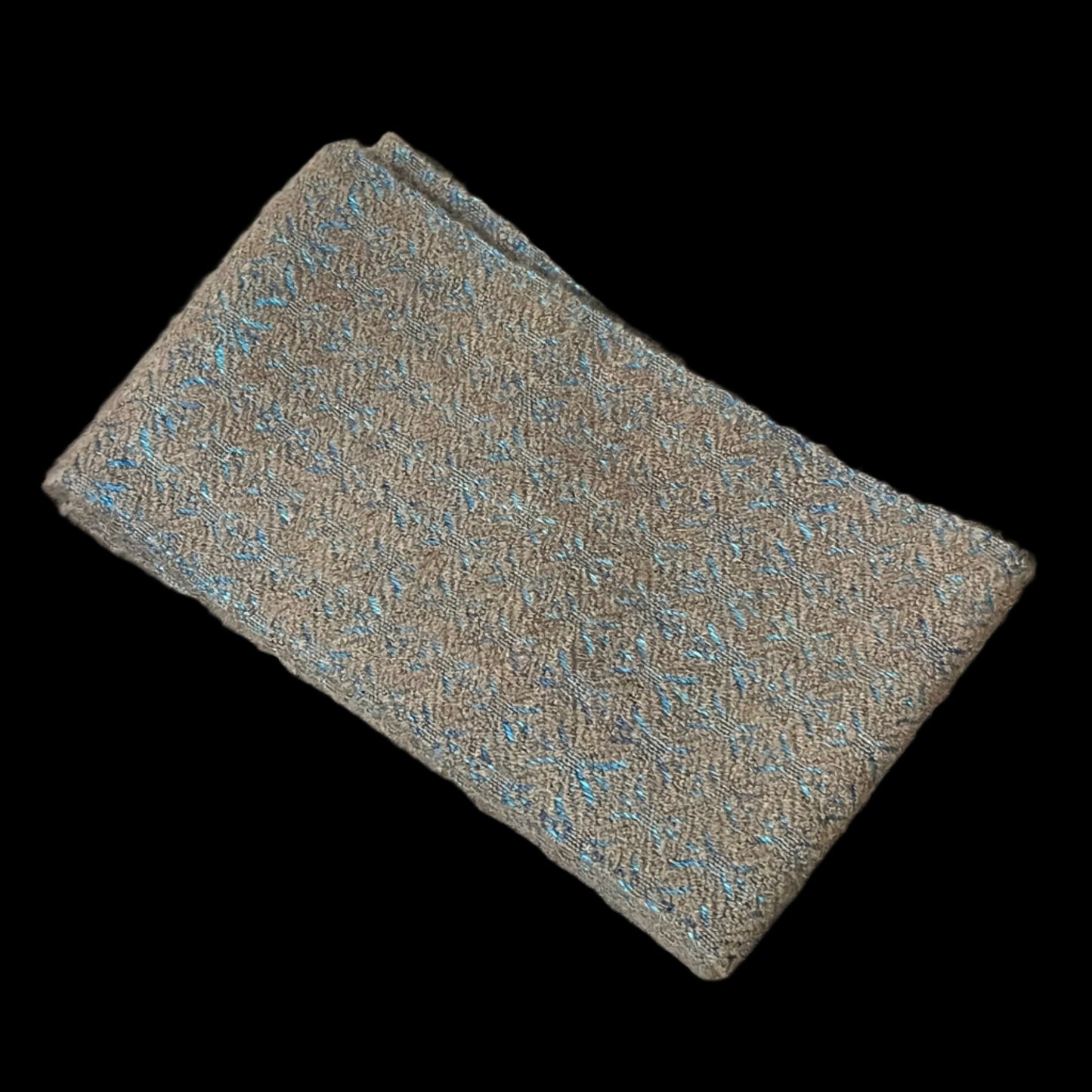Handmade qiviut (musk ox hair) scarf. The wrap on this scarf is silk, the weft is 100% qiviut. Certified Made in Alaska.