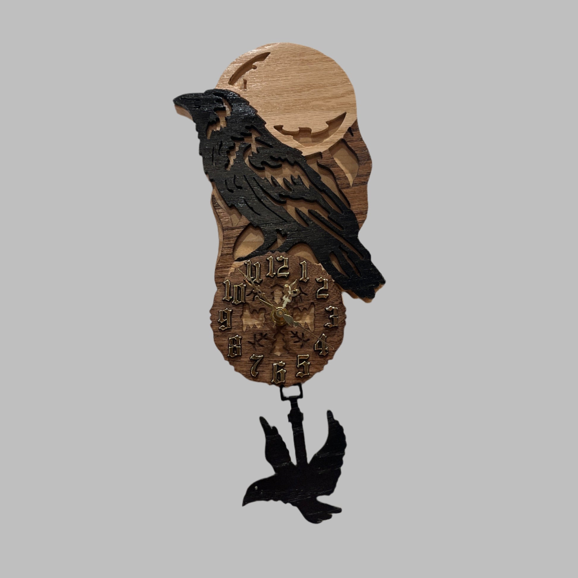 raven pendulum clock