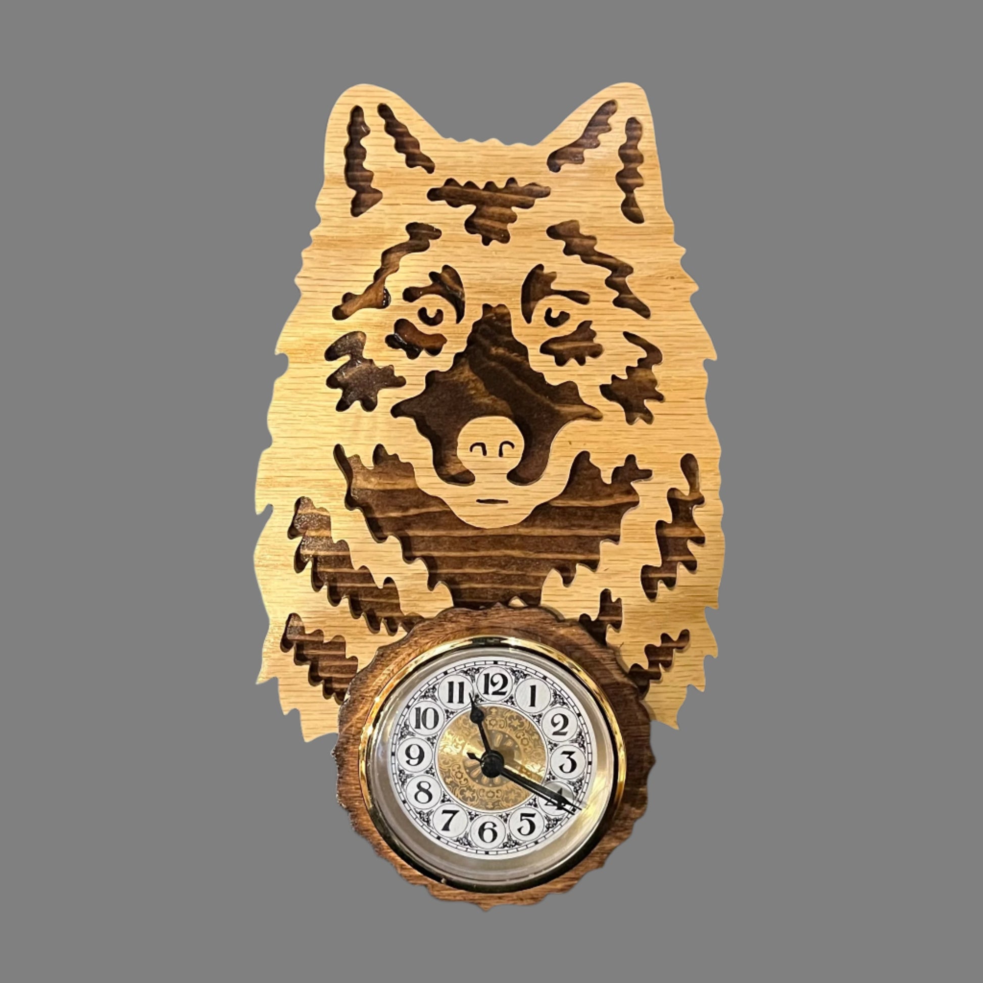 Wooden wolf clock, hand scroll sawed, with high quality movements, designed for years of service. One AA battery included.