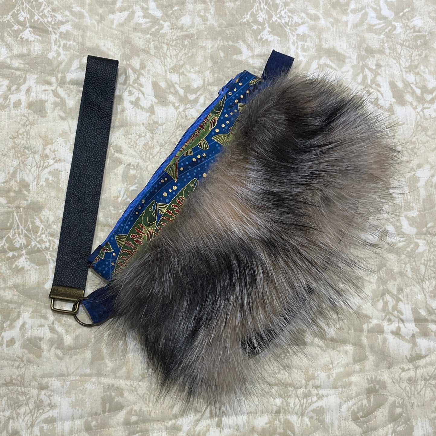 Cross Fox fur clutch purse with strap. Made from leather and silver fox fur with raven and fish trim.