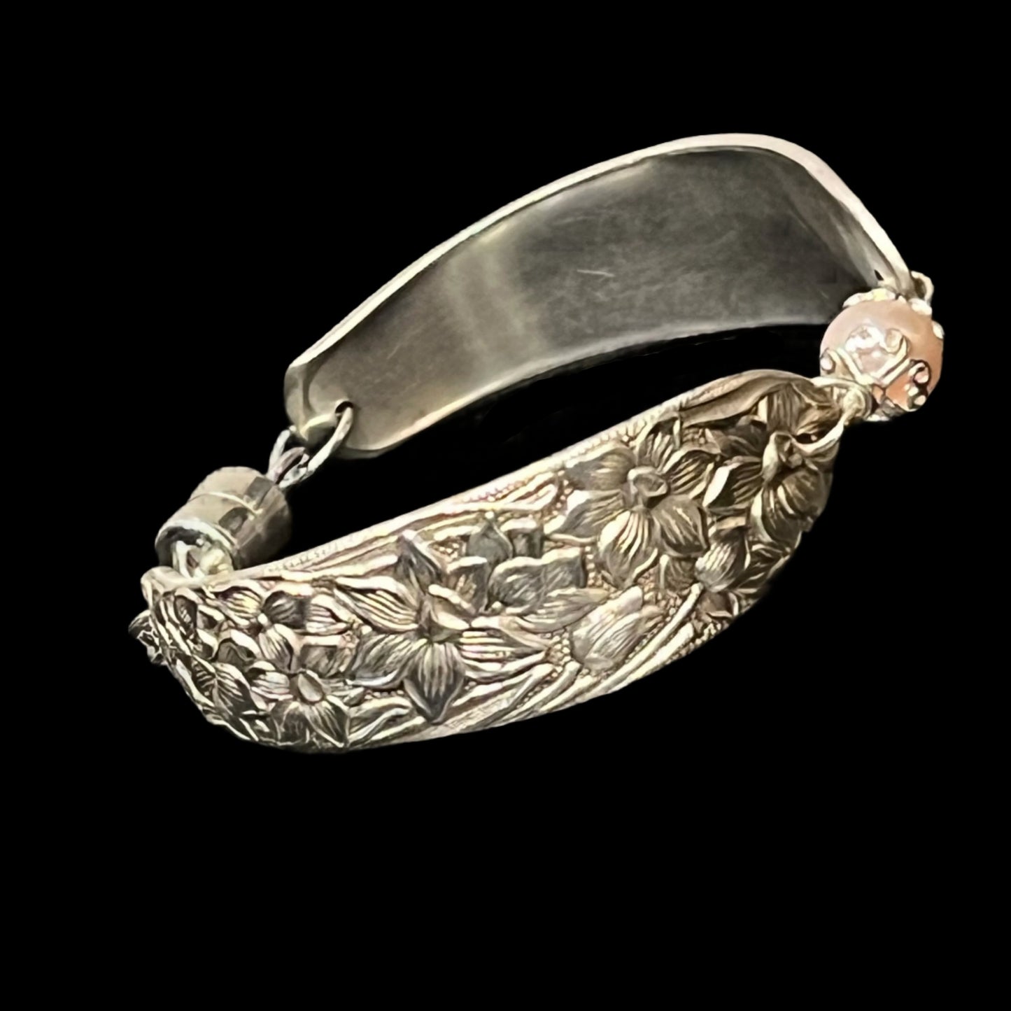 Upcycled spoon bracelet with "Narcissus" pattern, circa 1935, Swarovski Crystal Pearl, and magnetic clasp, Certified Made in Alaska jewelry.