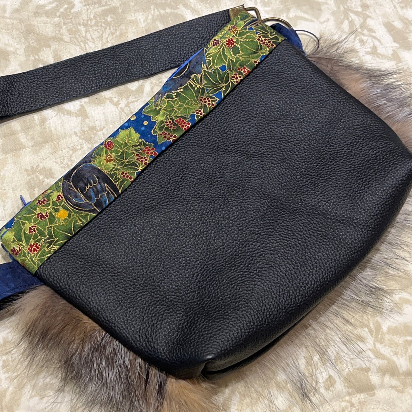 Cross Fox fur clutch purse with strap. Made from leather and silver fox fur with raven and fish trim.