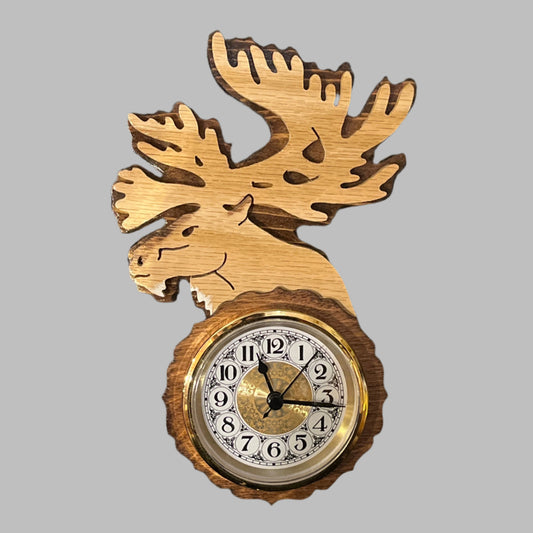 Wooden caribou clock, hand scroll sawed, with high quality movements, designed for years of service. One AA battery included.