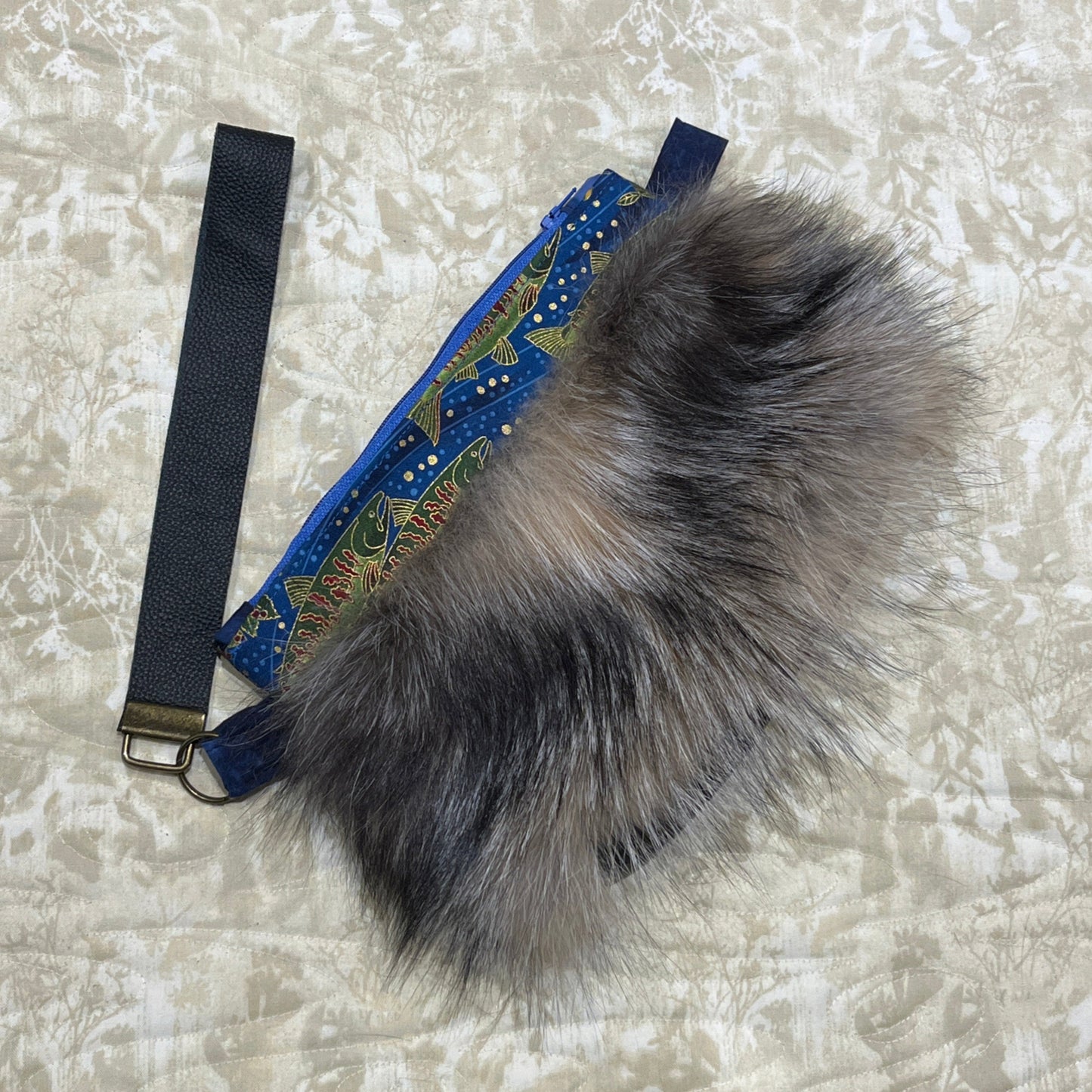 Cross Fox fur clutch purse with strap. Made from leather and silver fox fur with raven and fish trim.
