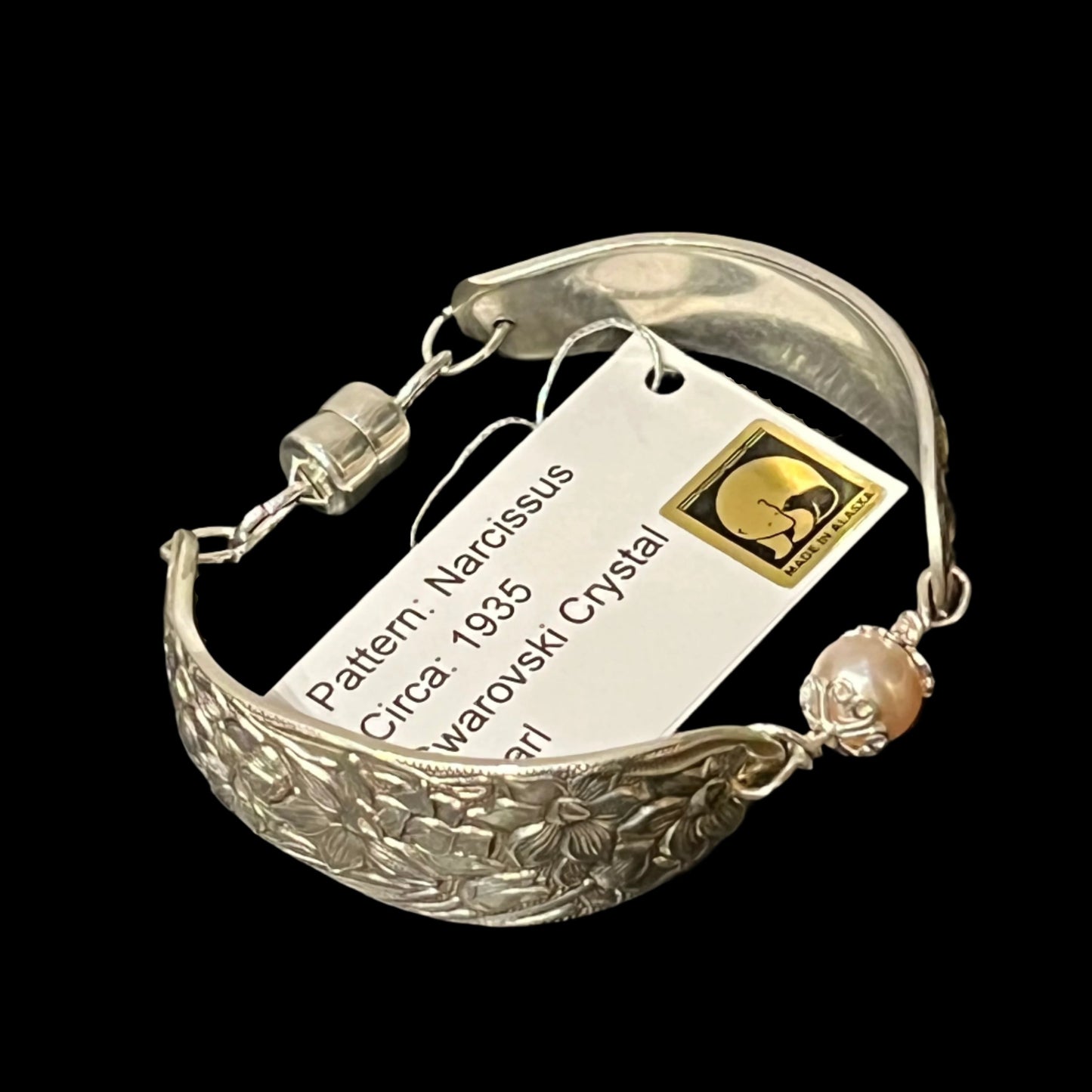 Upcycled spoon bracelet with "Narcissus" pattern, circa 1935, Swarovski Crystal Pearl, and magnetic clasp, Certified Made in Alaska jewelry.