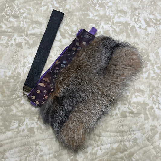 Cross Fox fur clutch purse with strap. Made from leather and cross fox fur with purple animal tracks trim