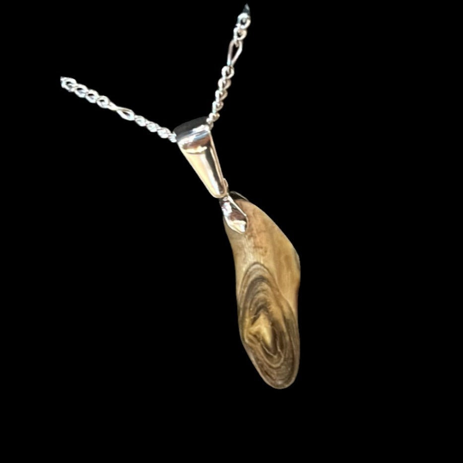 Alaskan Coral Pendant with small brown swirl