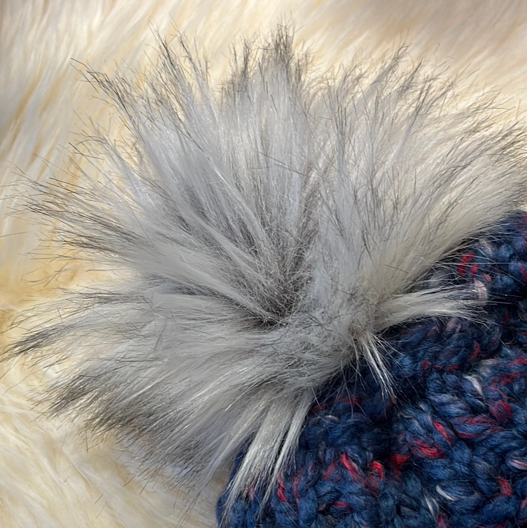 Orchard Beanie (Blue) Wool acrylic blend yarn with removable pom pom. Care: Remove pom, gentle wash dry flat.