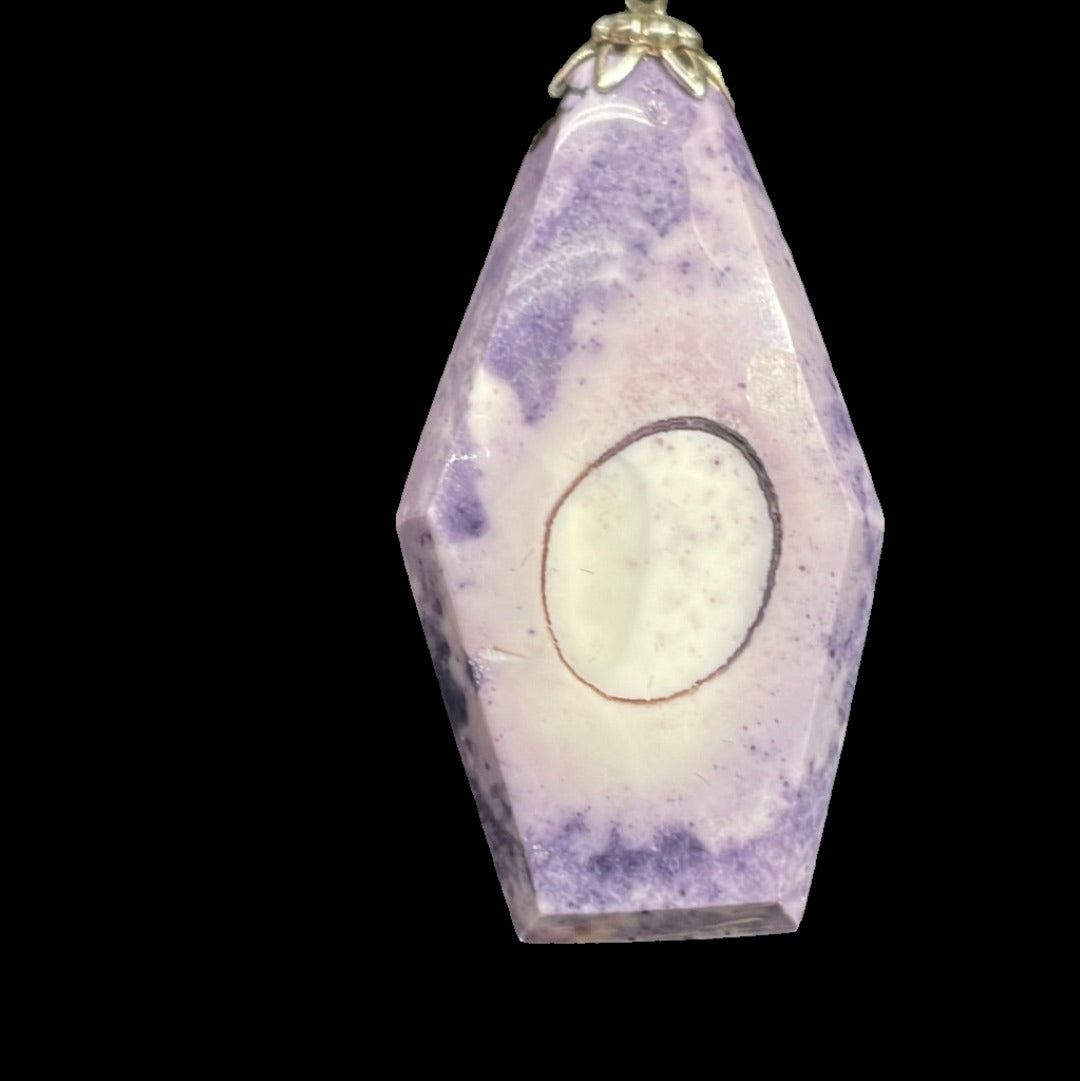 Tiffany Stone pendant on silver. This unique piece of jewelry is authentic Alaska Native art created by an enrolled member of an Alaska Native tribe.