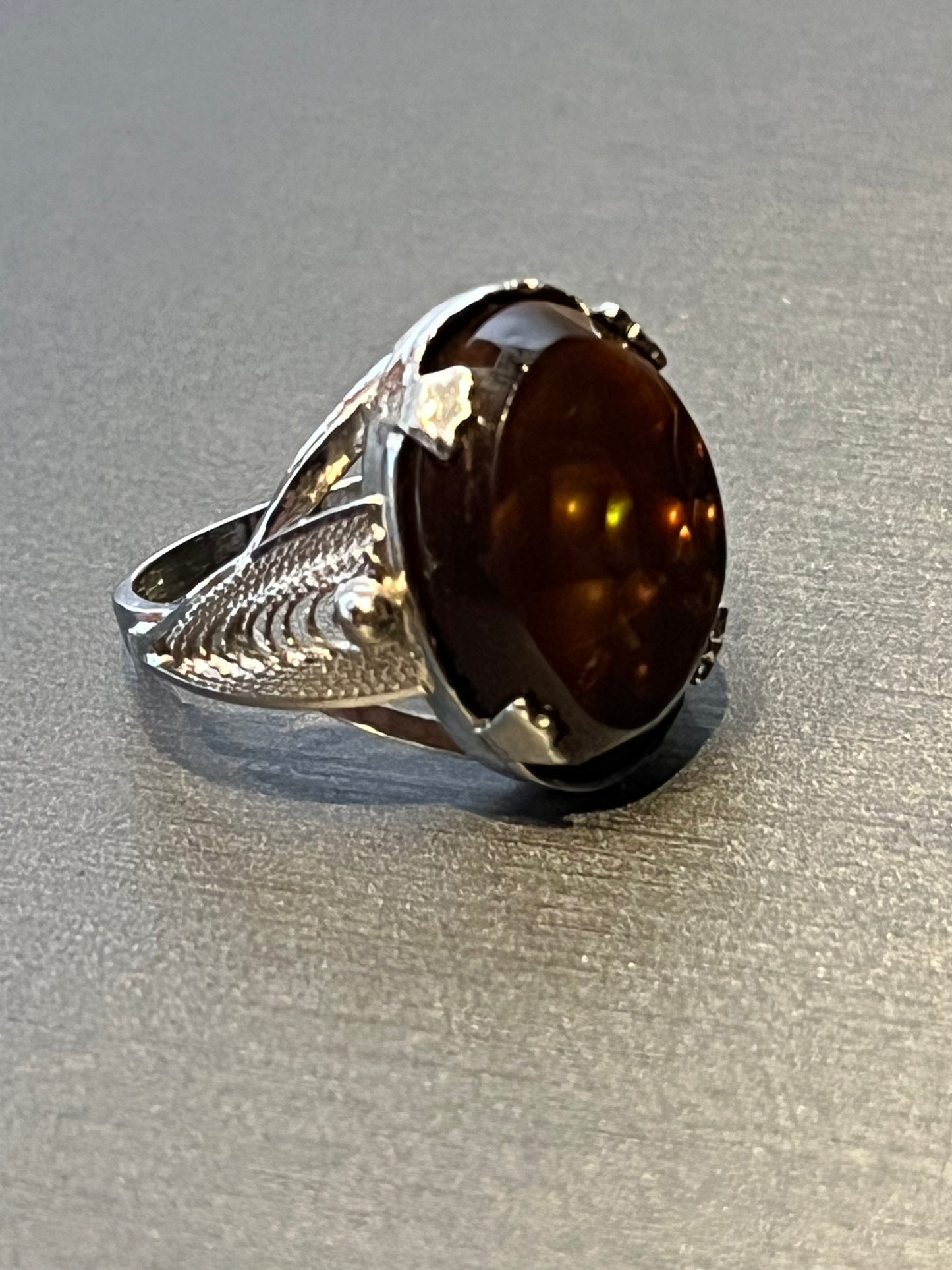 Vintage 1940's silver Sorrento ring with Fire Agate. This unique piece of jewelry is authentic Alaska Native art created by an enrolled member of an Alaska Native tribe. Certified Silver Hand and Made in Alaska jewelry.