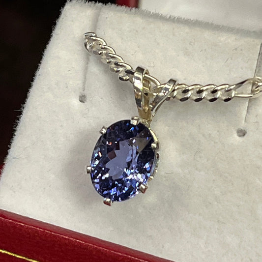 Brilliant 2.49 carat oval Tanzanite pendant in sterling silver on chain. This rare gemstone is a birthstone of December, and is a traditional 24th anniversary gift. This unique piece of jewelry is authentic Alaska Native art created by an enrolled member of an Alaska Native tribe. Certified Silver Hand and Made in Alaska jewelry.