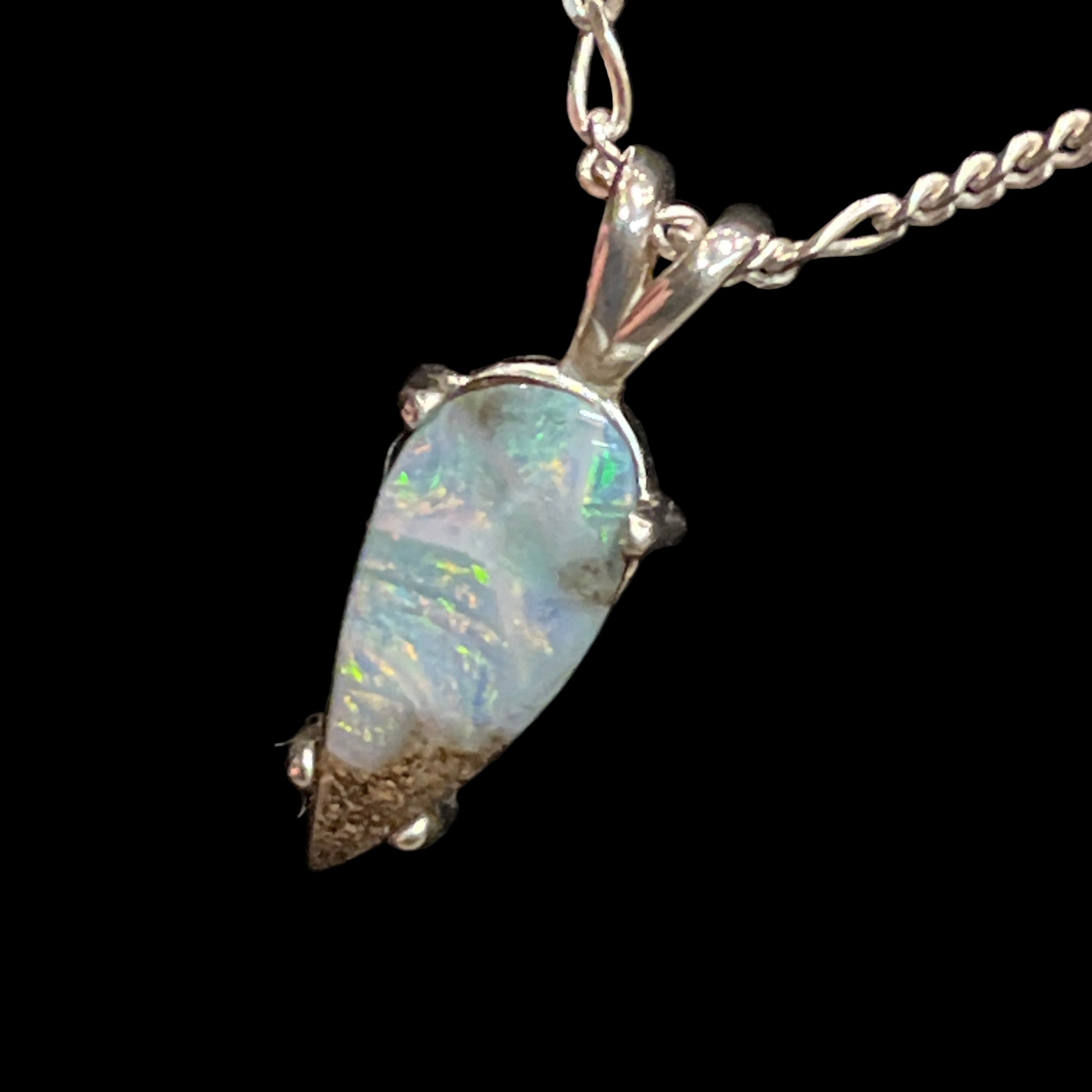 Australian Boulder Opal "Painted Lady" pendant in sterling silver on 20" chain. This is a unique piece of jewelry; you will receive the exact piece shown. Made in Alaska by a registered member of an indigenous tribe.