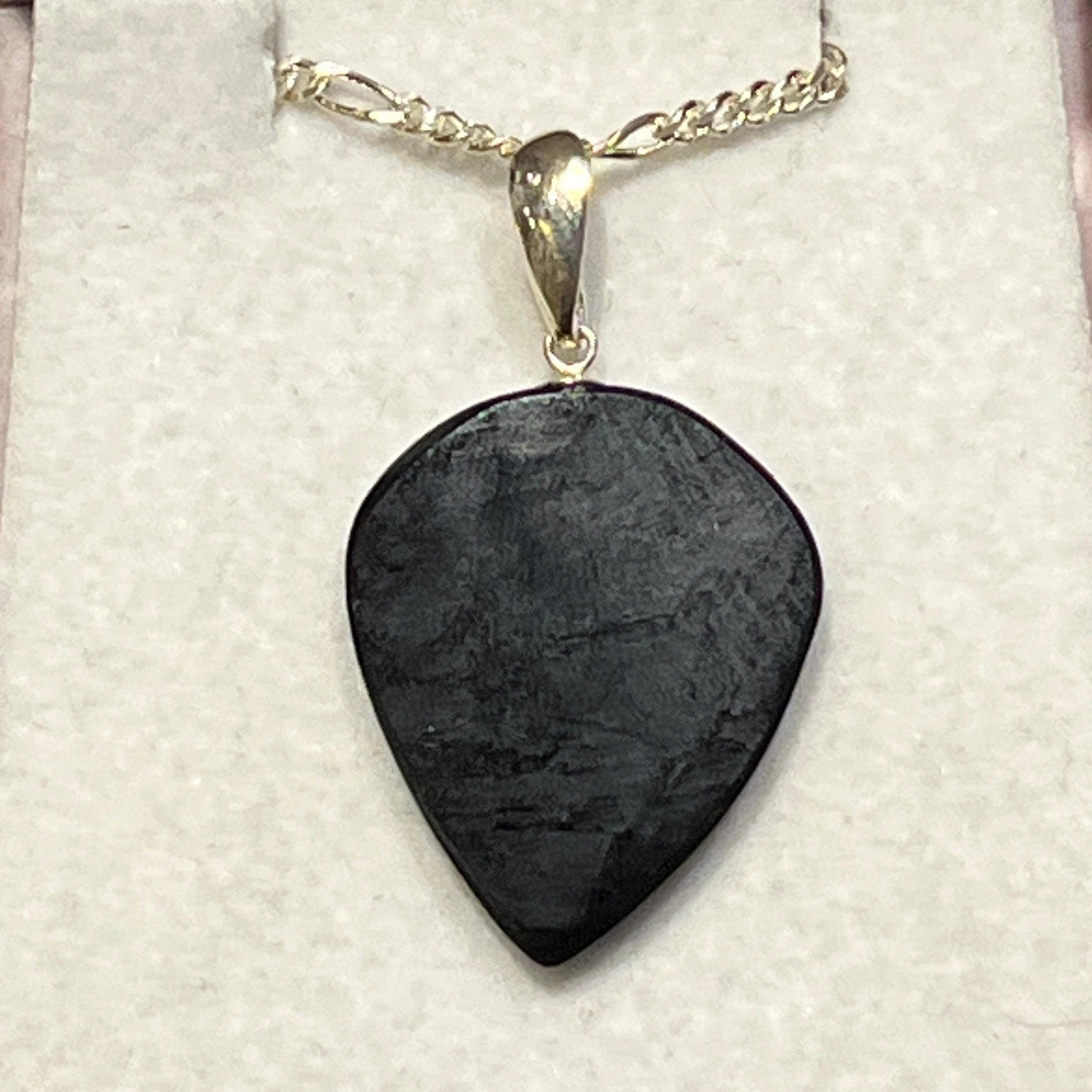 Alaskan Black Jade guitar pic pendant in sterling silver