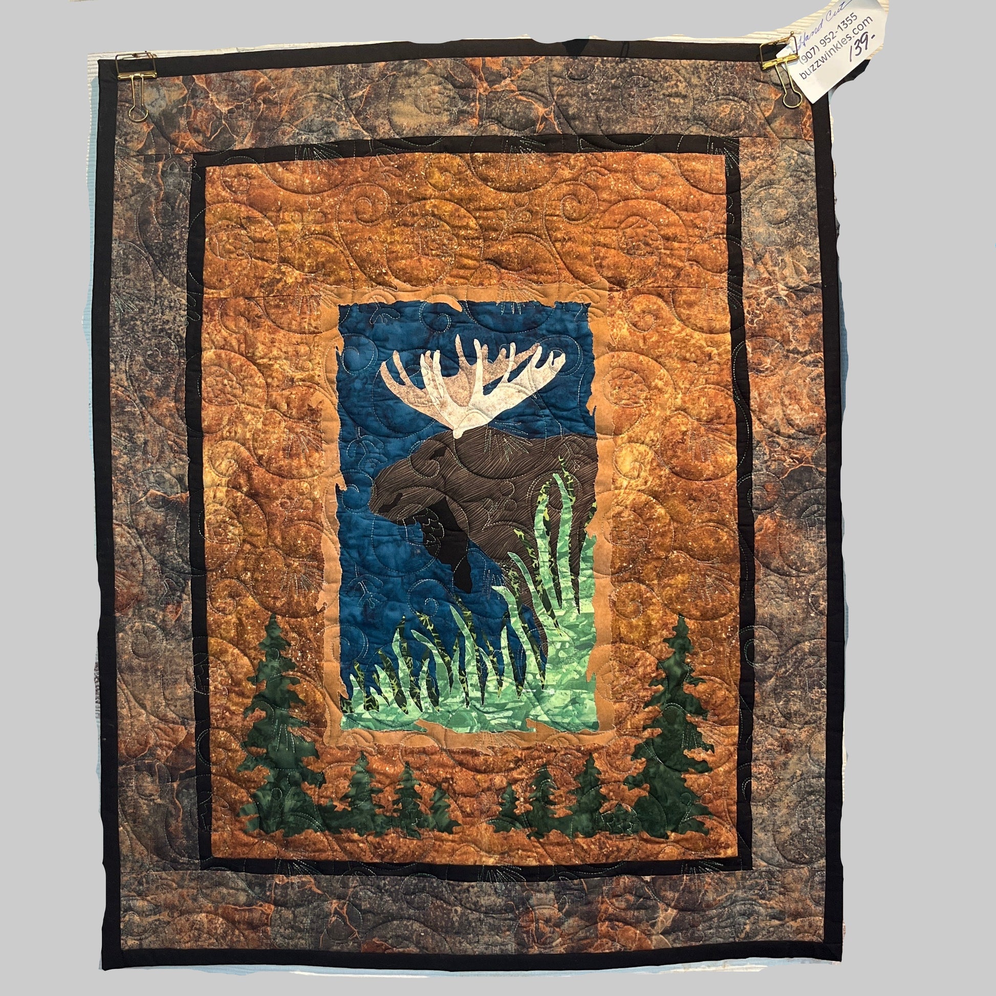 Quilted wall hanging with a moose desgn