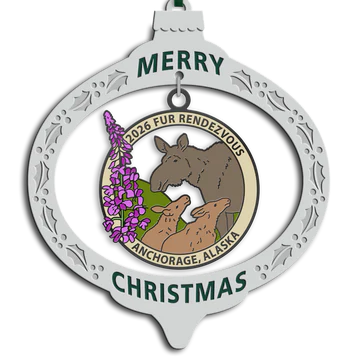 Decorative Christmas ornament with moose and floral design, featuring text 'Merry Christmas' and 'Fur Rendezvous Anchorage, Alaska'.